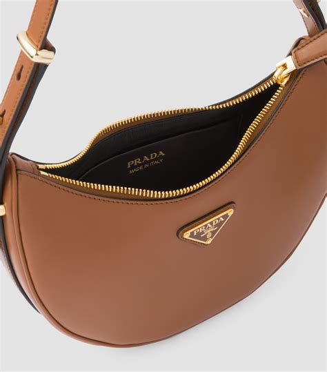 prada arqueé leather shoulder bag.